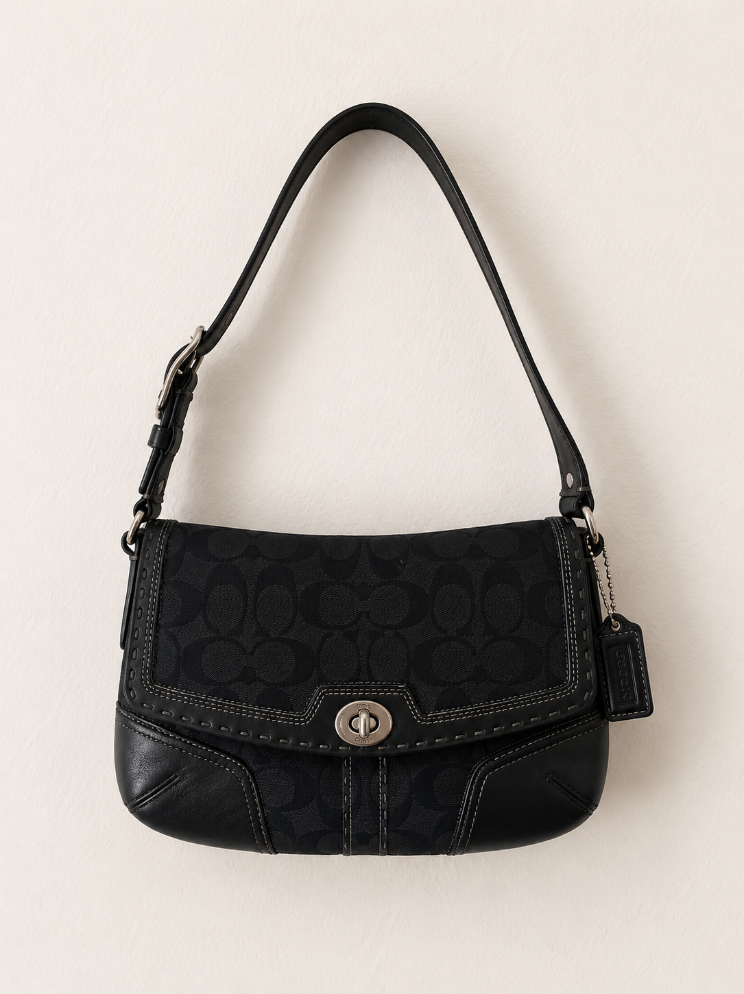 Coach black monogram turn lock Soho bag